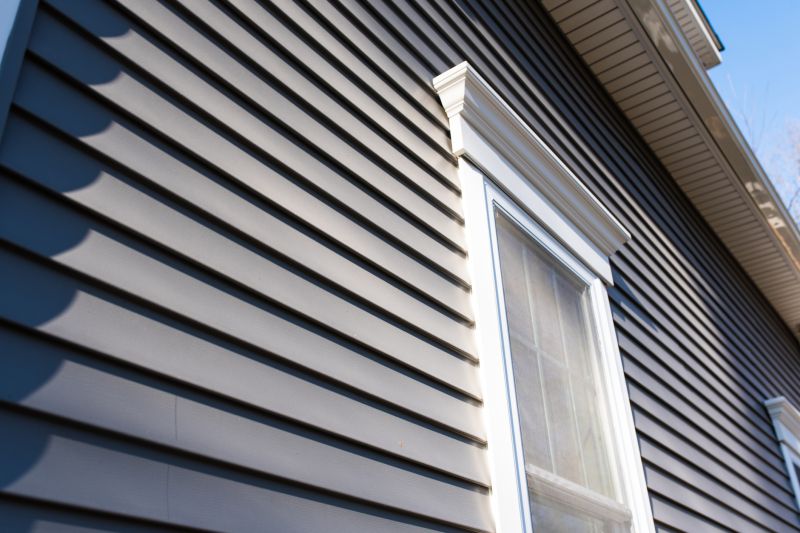 Red Vinyl Siding Installation